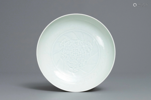A Chinese celadon saucer dish with underglaze …