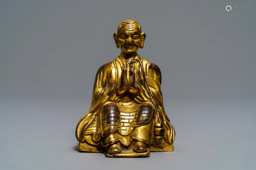 A Sino-Tibetan gilt bronze figure of a Lama, 19t…