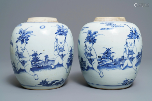 A pair of Chinese blue and white jars with boys in a