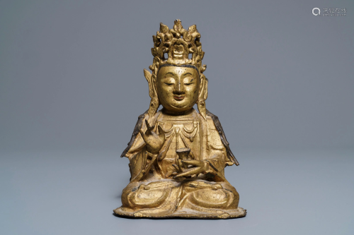 A Sino-Tibetan gilt bronze figure of Buddha, Ming