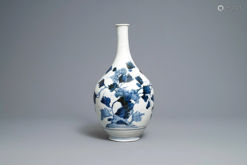 A large Japanese blue and white Arita bottle vase, E…