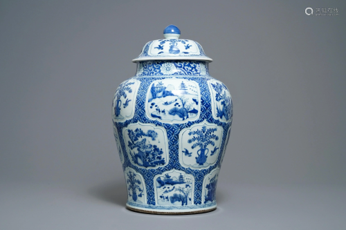 A Chinese blue and white covered vase with flor…