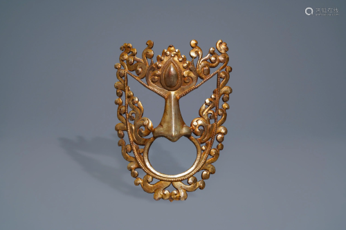 A Tibetan gilt bronze dance mask, 18th C.