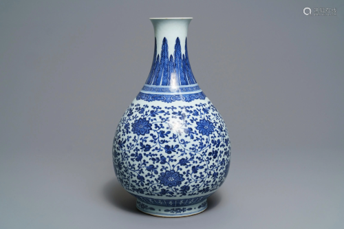 A Chinese blue and white 'peony scroll' bottle vase,