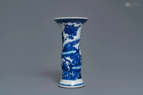 A Chinese blue and white vase with birds among…