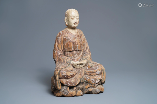 A large Chinese painted wood figure of a Buddhist m…