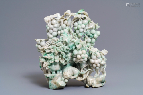 A Chinese jadeite carving of two cats among …