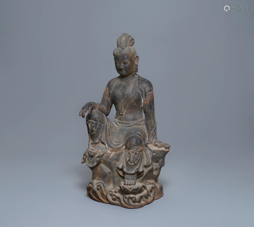 A large Chinese cast iron figure of Guanyin with