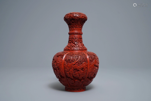 A Chinese carved cinnabar lacquer bottle vase,…