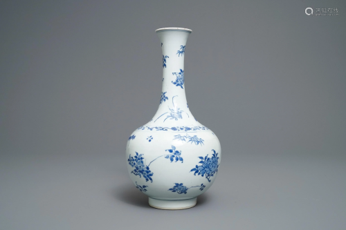 A Chinese blue and white bottle vase with floral