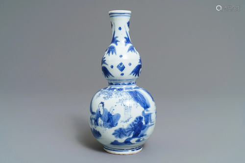 A Chinese blue and white double gourd vase wit…