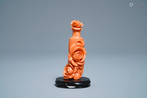 A Chinese carved red coral snuff bottle with roses,