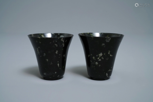 A pair of Chinese dark green jade wine cups, Qing