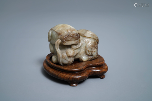 A Chinese pale grey-brown jade model of a Budd…