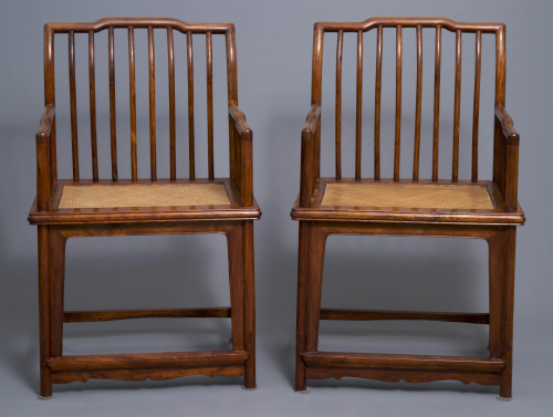 A pair of Chinese huanghuali wood chairs, Rep…
