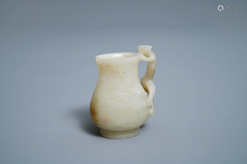 A Chinese celadon russet jade chilong- Handled …
