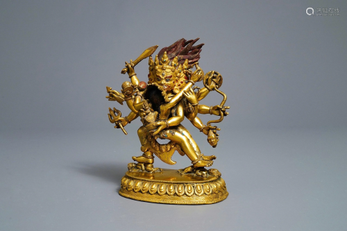 A Sino-Tibetan gilt bronze group of Mahakala a…