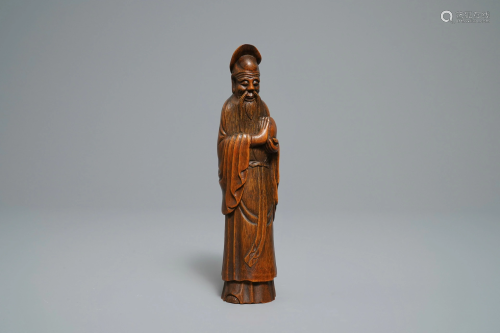 A Chinese carved bamboo figure of Shoulao,