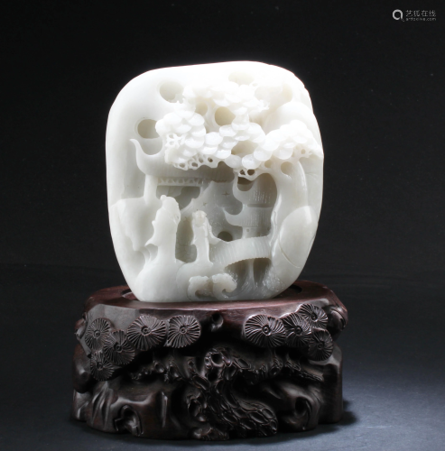 A Chinese White Jade Carving with Wooden Stand
