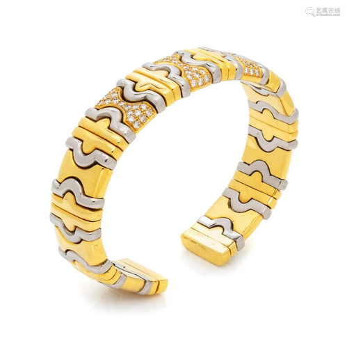 DINO CEVA, YELLOW GOLD, STEEL AND DIAMOND…