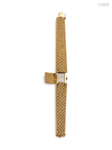 NIVADA, 14K YELLOW GOLD SURPRISE WATCH