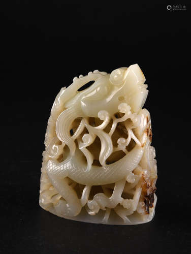 A FINE CARVED WHITE AND RUSSET JADE ORNAMENT, QING DYNASTY