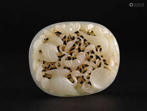 A RETICULATED WHITE JADE PLAQUE, QING DYNASTY