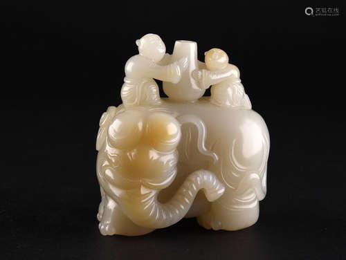 A CREAMY WHITE AND RUSSET ELEPHANT AND KIDS GROUP, QING DYNASTY