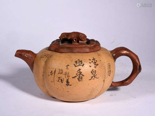 A MARKED YIXING GLAZED TEAPOT, QING DYNASTY