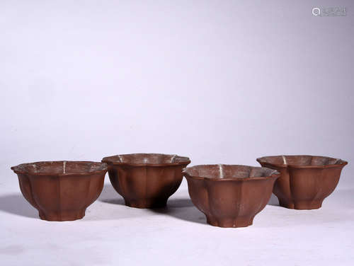 FOUR YIXING GLAZED TEA CUPS, 20TH CENTURY