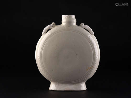 AN INCISED TING TYPE MOON FLASK, SUNG DYNASTY