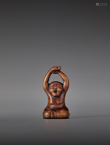 HOGEN: A FINE WOOD NETSUKE OF A YAWNING O…