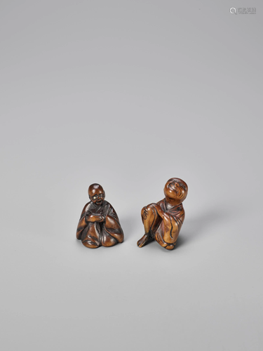 TWO WOOD NETSUKE OF BLIND MEN APPLYING M…