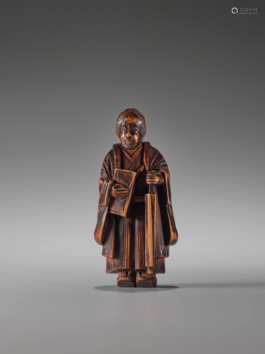 A WOOD NETSUKE OF A LADY WITH BOOK AND UM…