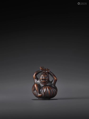 HOZAN: A WOOD NETSUKE OF A PUMPKIN DAR…