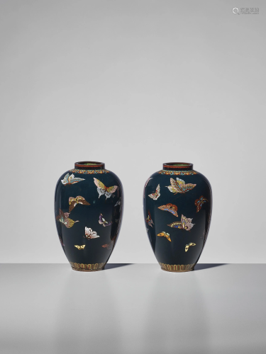 A PAIR OF CLOISONNE ENAMEL VASES WITH BUTTER…