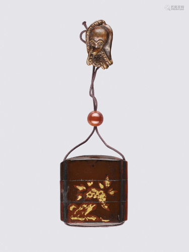 A LACQUERED WOOD INRO WITH NETSUKE