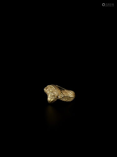 A FINE CHAM GOLD NAGA RING DEPICTING GAR…