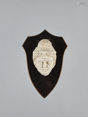 A GANDHARA STUCCO HEAD OF BUDDHA SHAKYAM…