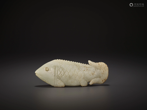 A CELADON JADE FISH CARVING, QING