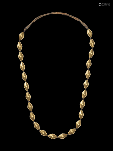 A BURMESE GOLD NECKLACE WITH 24 LARGE …