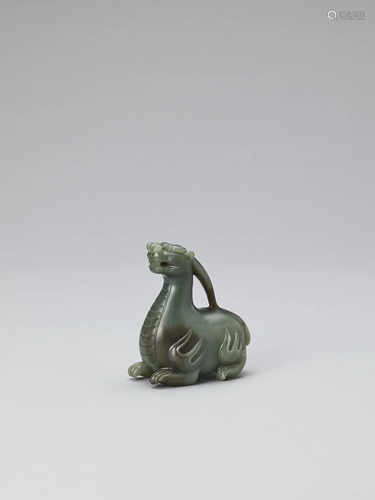 A SPINACH GREEN JADE QILIN, LATE QING TO R…