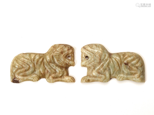 A 'BUDDHIST LION' JADE PENDANT, 20th CENTURY