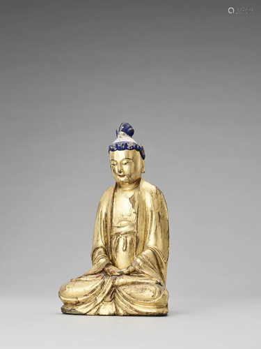 A LACQUER-GILT AND CARVED WOOD FIGURE OF B…