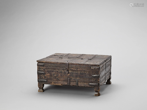 A PERSIAN CARVED WOOD CHEST, 17TH-18TH C…