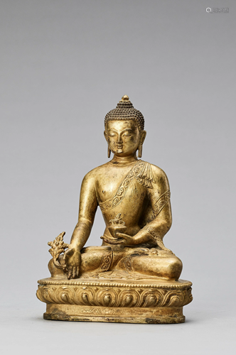 A SINO-TIBETAN GILT BRONZE FIGURE OF BUDDHA