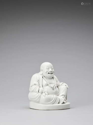 WHITE GLAZED DEHUA PORCELAIN FIGURE OF BUDA…