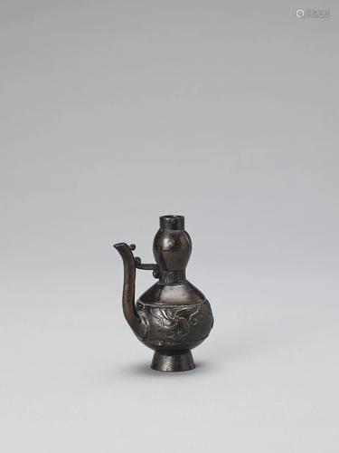 A BRONZE MINIATURE EWER, LATE MING TO EARLY …