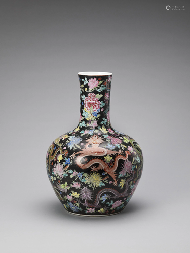 A BLACK-GROUND FAMILLE ROSE VASE, TIANQIU…