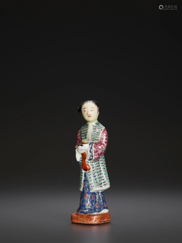 A MOLDED PORCELAIN COURT LADY, QING